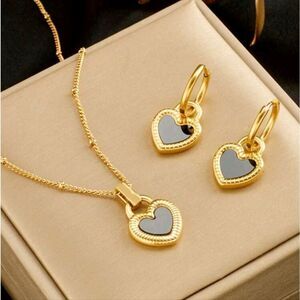 Elegant Black & White Double-Sided Heart Pendant Necklace